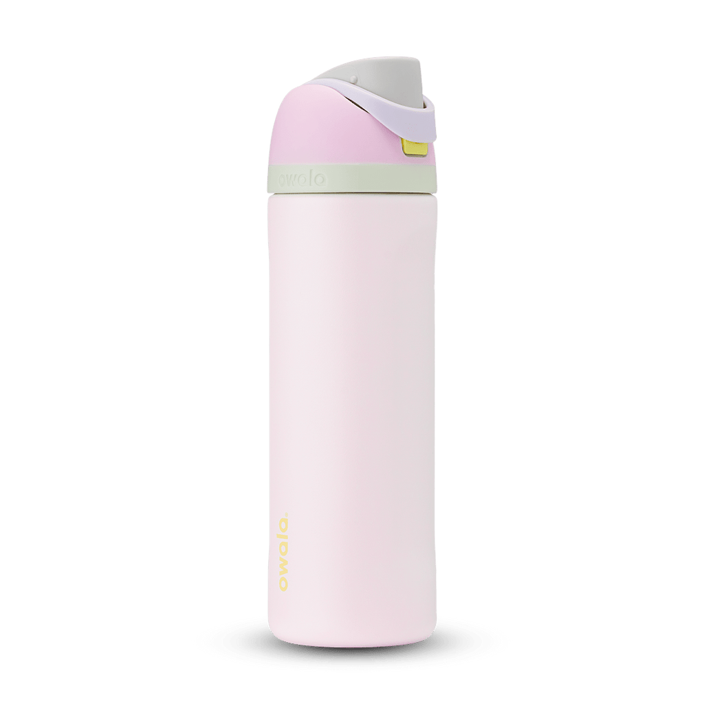 Owala FreeSip 24oz in Out of the Blue, periwinkle blue insulated bottle with matching blue-lavender flip cap and carry loop