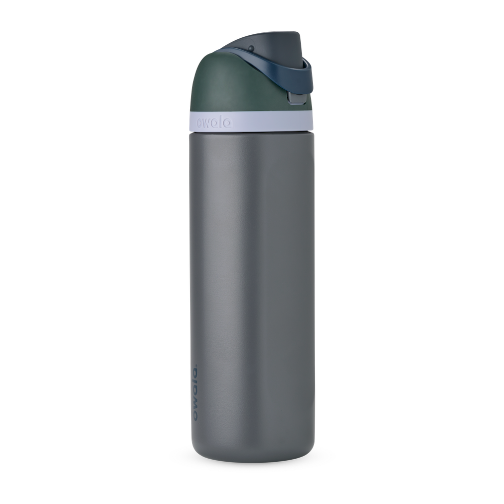 Owala FreeSip 24oz in Out of the Blue, periwinkle blue insulated bottle with matching blue-lavender flip cap and carry loop